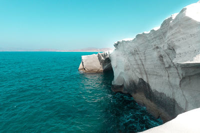 Scenic view of sea against clear blue sky