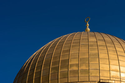 Dome of temple mount against clear blue sky