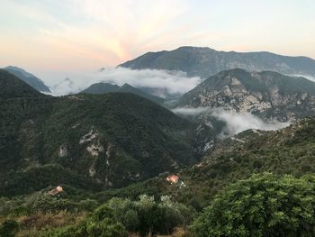 Scenic view of mountains against sky during sunset