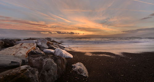 Scenic view of sea against sky during sunset