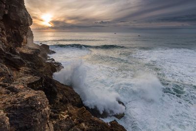 Scenic view of sea against sky during sunset