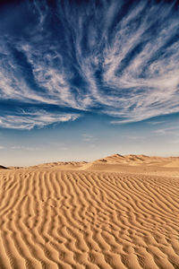 Scenic view of desert against sky