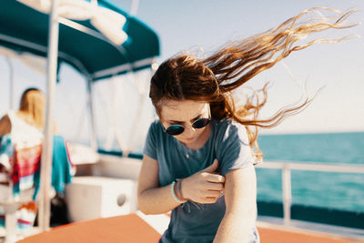 Young woman wearing sunglasses outdoors