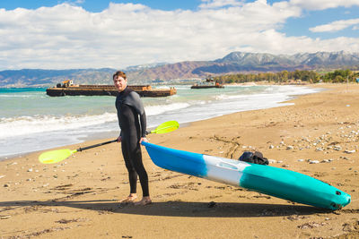 Full length of boy on beach