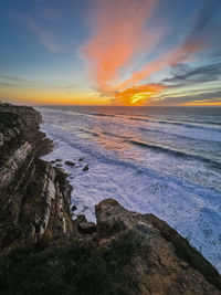 Scenic view of sea against sky during sunset