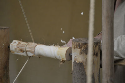 Close-up of rusty pipes against wall