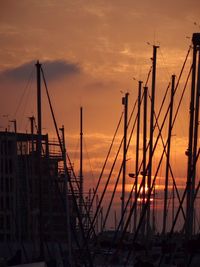 View of harbor at sunset