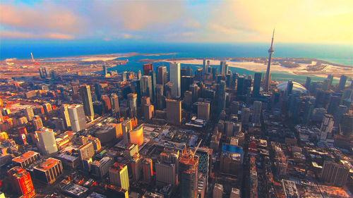 Aerial view of cityscape against sky during sunset.toronto city,cannada