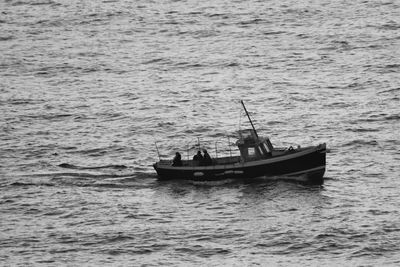 Boat sailing in sea