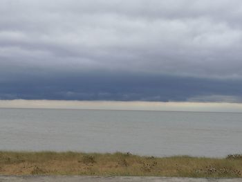 View of sea against cloudy sky