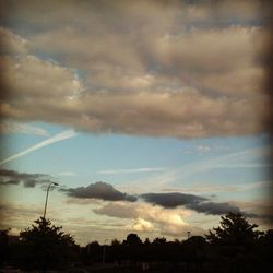 Scenic view of cloudy sky at sunset