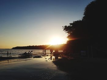 Silhouette of beach during sunset