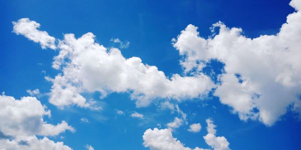 Low angle view of clouds in blue sky