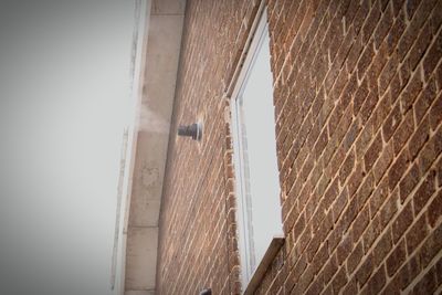 Low angle view of built structure against clear sky