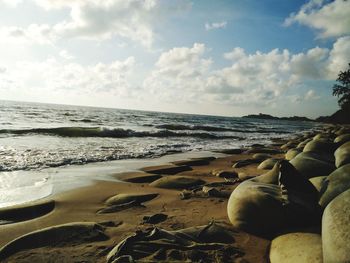 Scenic view of beach against sky