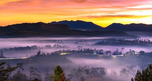 Panoramic view of mountains against sky during sunset