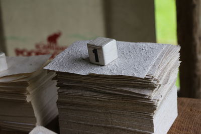 Close-up of books on wooden table