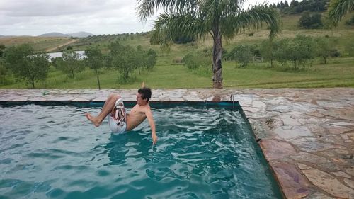 Woman standing in water