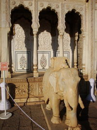 Statue of temple in building