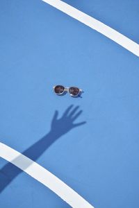 Close-up of shadow on blue wall