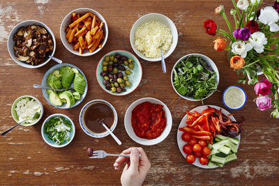 Directly above shot of person preparing food on table