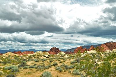 Rock formations on landscape against sky