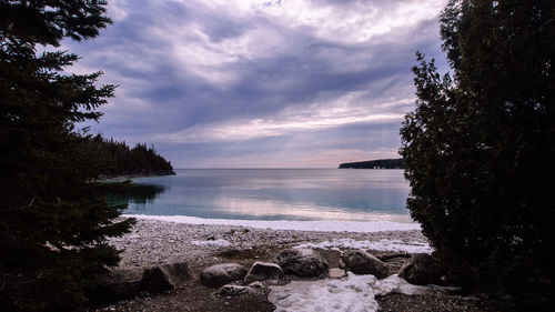 Scenic view of sea against sky during sunset
