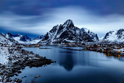 Scenic view of snowcapped mountains against sky during winter