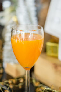 Close-up of orange juice in glass