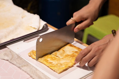 Midsection of man preparing food