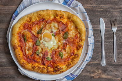 High angle view of pizza on table