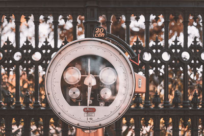 Close-up of clock against wall