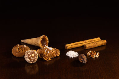 High angle view of decoration on table against black background
