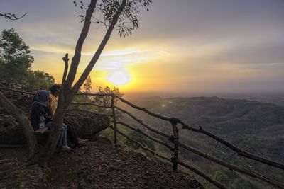 Scenic view of landscape against sky during sunset