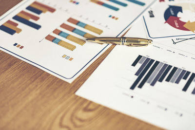 High angle view of graphs at desk in office