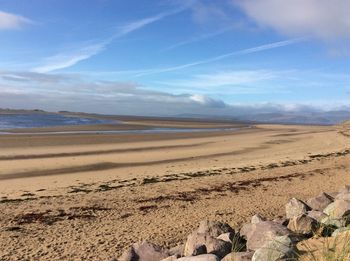 Scenic view of beach against sky