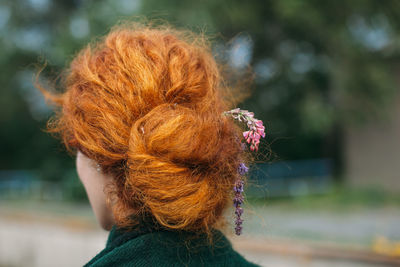 Close-up rear view of a young woman