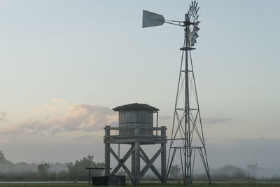 Low angle view of water tower against sky