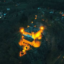 High angle view of illuminated fire in water at night