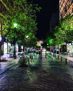Buildings in city at night
