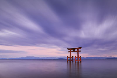 Scenic view of sea against sky at sunset