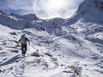 Trekking scene in winter on the italian alps