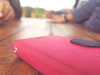 Close-up of hands on table