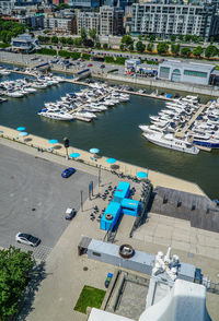 High angle view of harbor by buildings in city