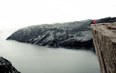 Scenic view of sea against sky during winter