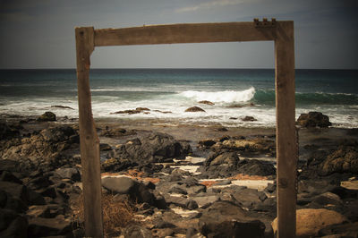 Scenic view of beach against sky