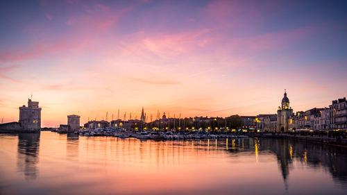 Old harbour of la rochelle, the french city and seaport. beautiful colorful sky and clouds