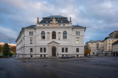 Buildings in city against sky