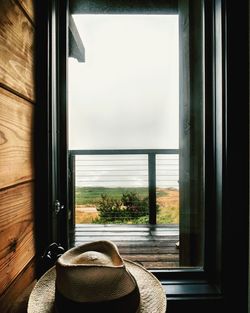 Close-up of window on table at home