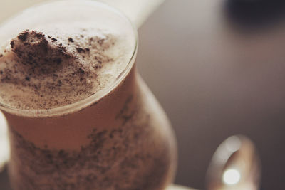 Close-up of coffee cup on table